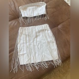White bodycon two piece skirt set. Size medium. Brand new. Never worn.
